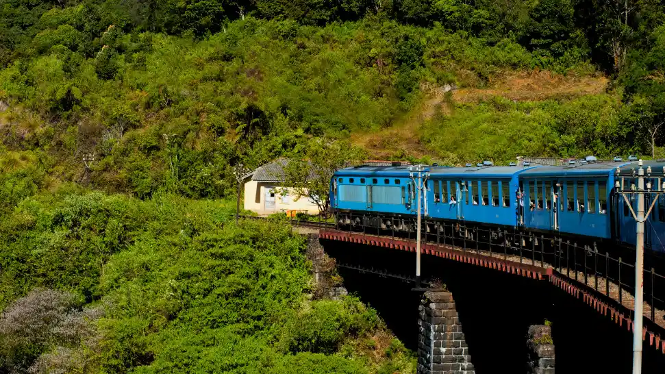 Darjeeling Himalayan Railway toy train with Kanchenjunga view