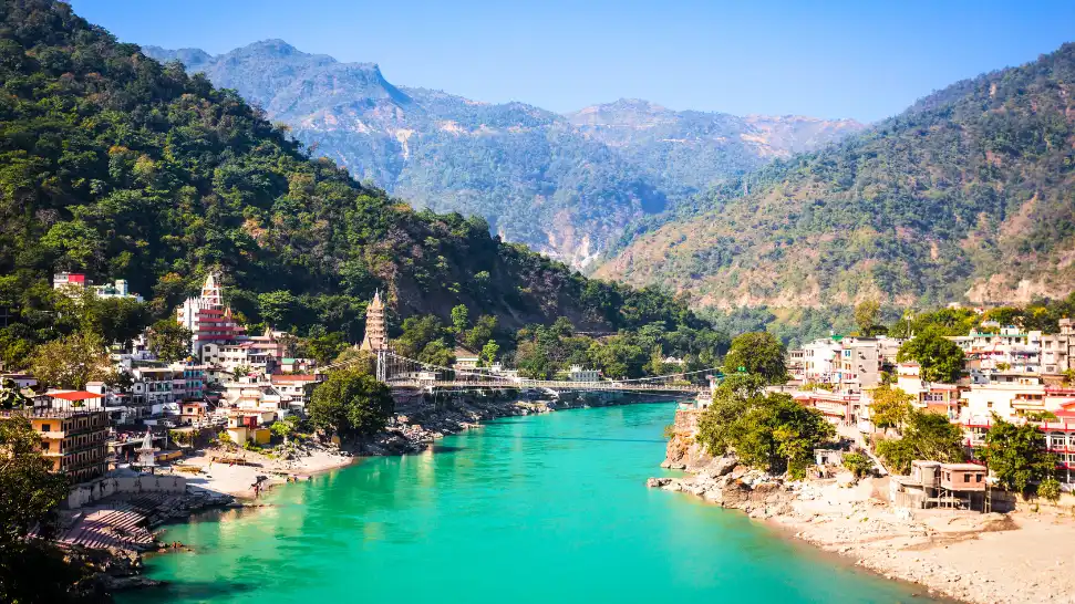 Beautiful view of Rishikesh with the Ganges River and surrounding hills