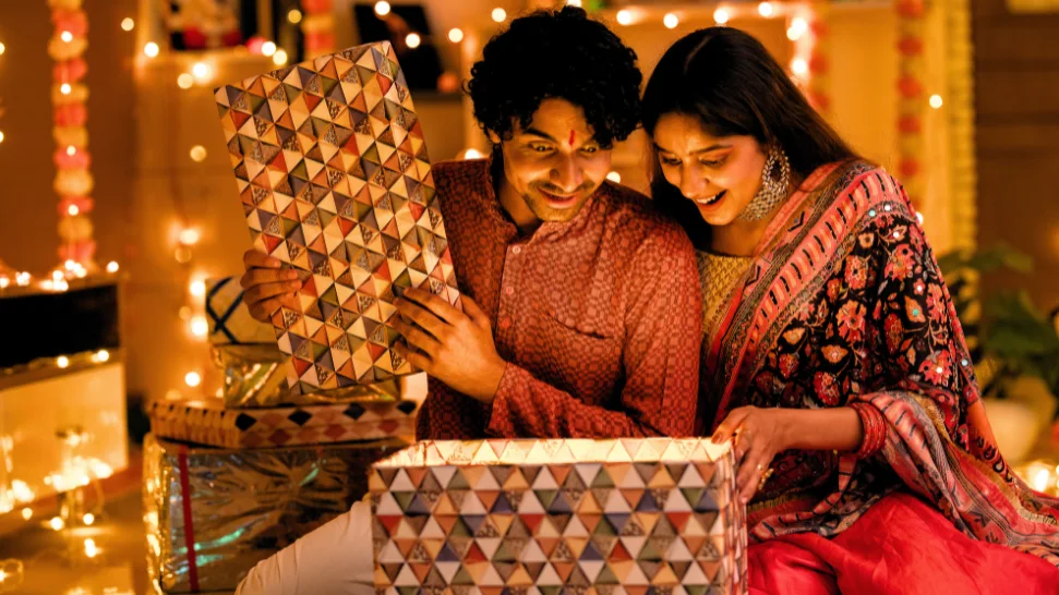 Diwali celebration in India with glowing diyas, illuminated homes and festive decorations
