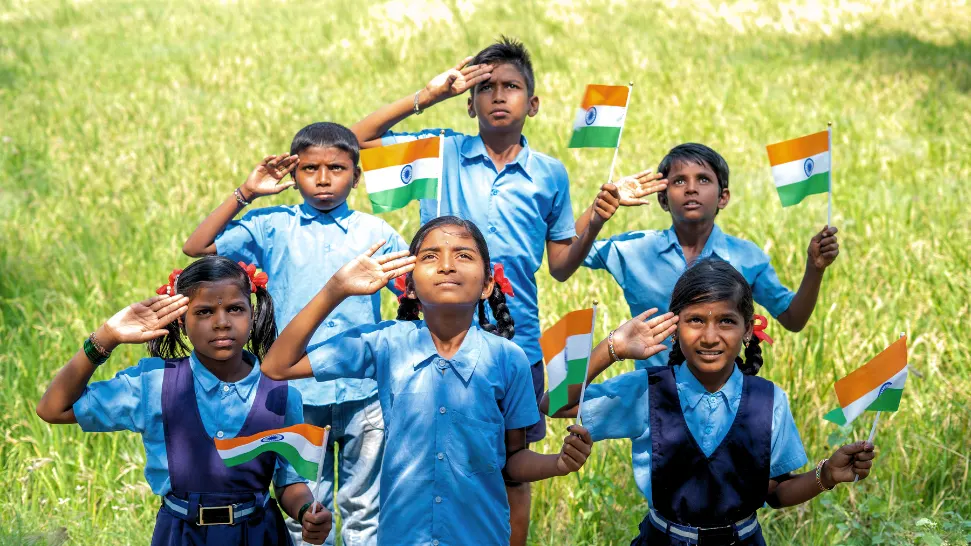 Republic Day parade in New Delhi with marching soldiers, decorated tableaux and the Indian national flag